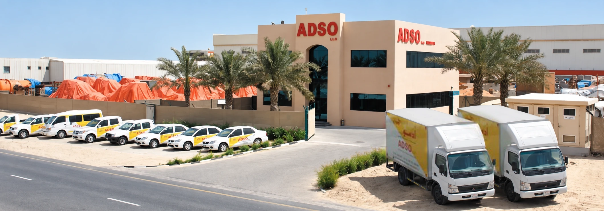 The ADSO office, with the company van and truck fleet parked outside